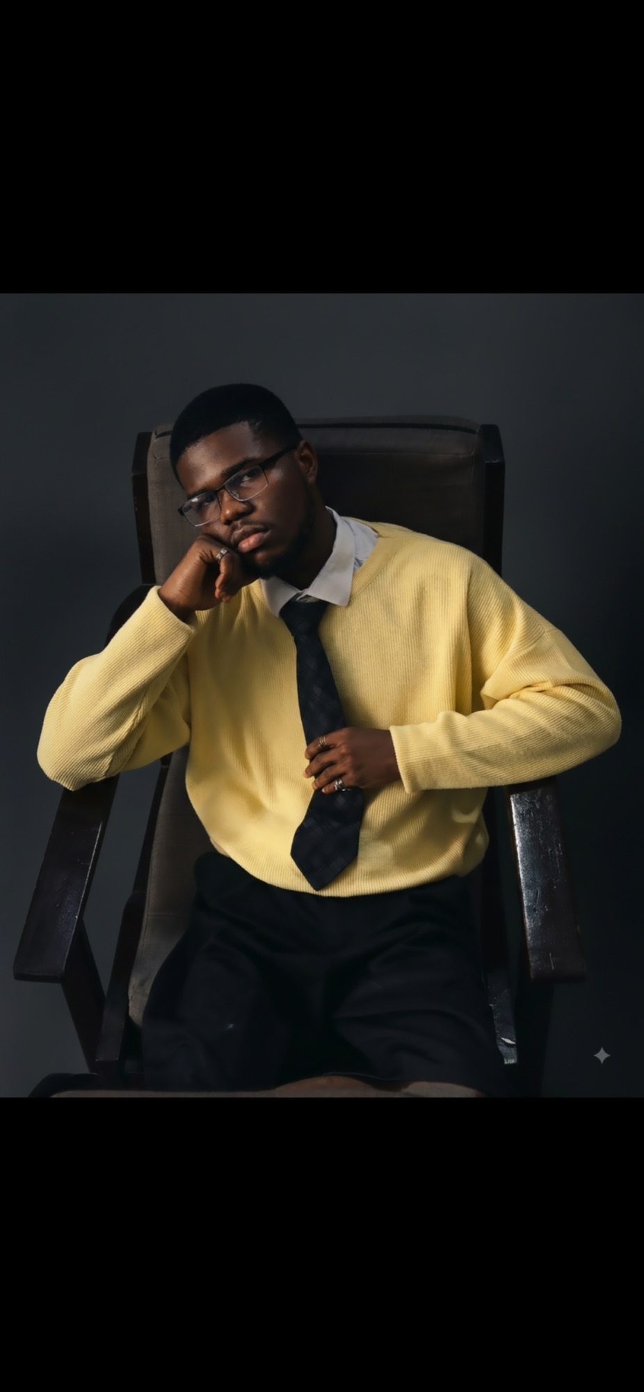 JaceBen portrait in yellow knit and tie